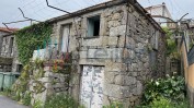 PRÉDIO URBANO COMPOSTO POR CASA COM DOIS PAVIMENTOS COM ÁREA TOTAL DE 223 M2