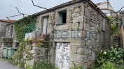 PRÉDIO URBANO COMPOSTO POR CASA COM DOIS PAVIMENTOS COM ÁREA TOTAL DE 223 M2