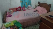 PRÉDIO RUBANO COMPOSTO POR CASA DE RÉS-DO-CHÃO E 1.º ANDAR DESTINADA A HABITAÇÃO