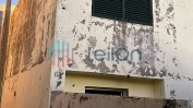 PRÉDIO URBANO COMPOSTO POR PRÉDIO DE HABITAÇÃO DE RÉS DO CHÃO E PRIMEIRO ANDAR