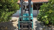 1 EMPILHADOR A GÁS DA MARCA “YANG”