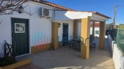 PRÉDIO URBANO, COMPOSTO POR CASA DE RÉS DE CHÃO PARA HABITAÇÃO, ANEXO, ARRECADAÇÃO E GARAGEM