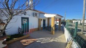 PRÉDIO URBANO, COMPOSTO POR CASA DE RÉS DE CHÃO PARA HABITAÇÃO, ANEXO, ARRECADAÇÃO E GARAGEM