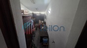 PRÉDIO URBANO, COMPOSTO POR CASA DE RÉS DE CHÃO PARA HABITAÇÃO, ANEXO, ARRECADAÇÃO E GARAGEM